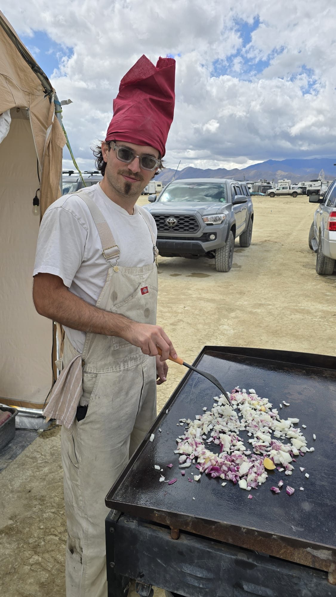 Camp founder at the plancha